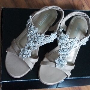 Stylish Tan Sandals with Floral Details